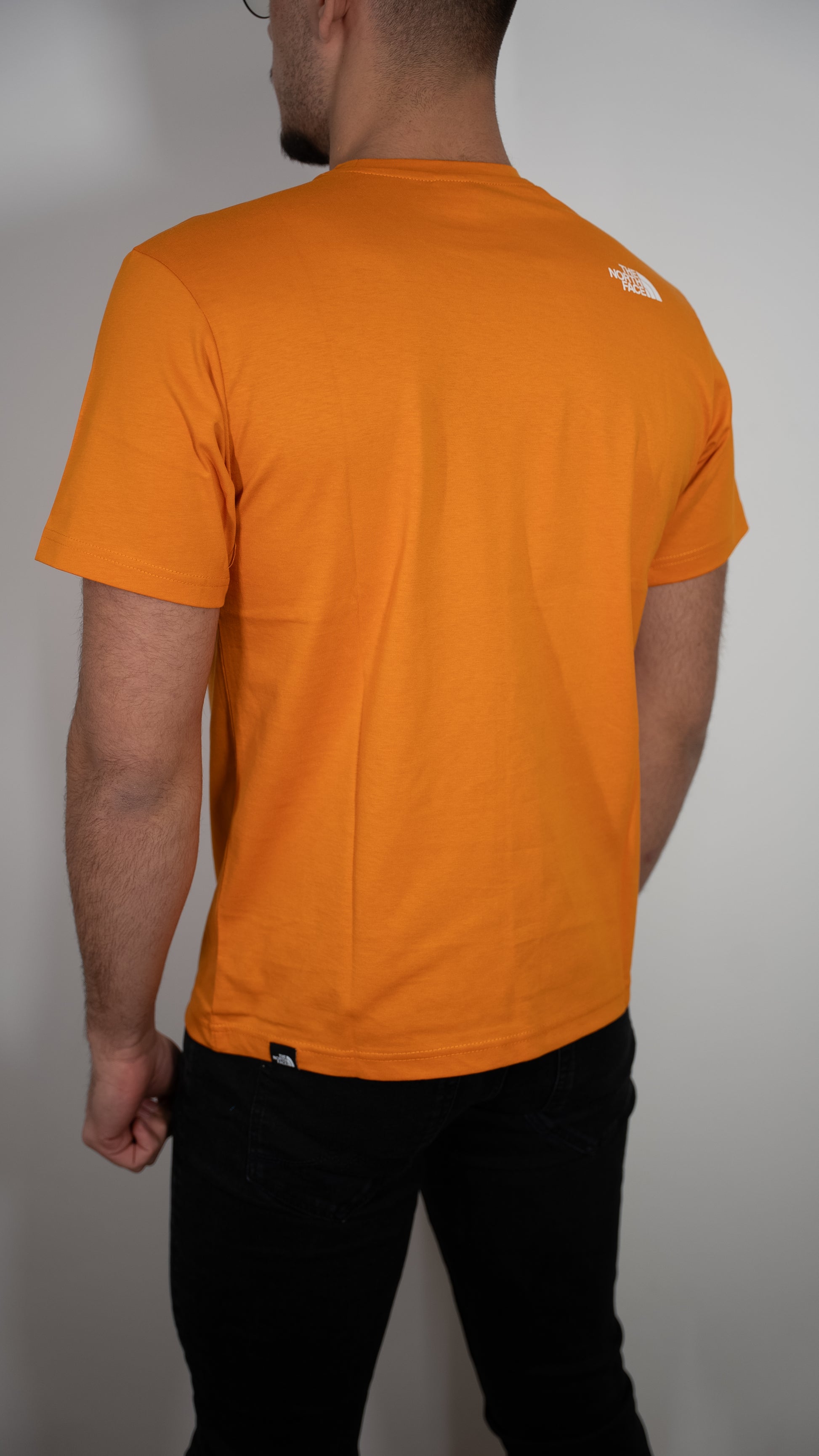 The North Face Narandžasta Majica sa Minimalistic Logom